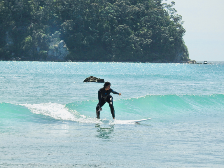 Women surfing together in the 5-Week Women’s Surf Program, Mount Maunganui