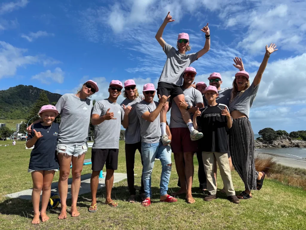 The Mount Surf School coaching team on Main Beach in Mount Maunganui